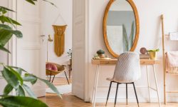 stylish-and-minimalist-interior-of-living-room-with-design-gold-armchair--e1697621230921.jpg
